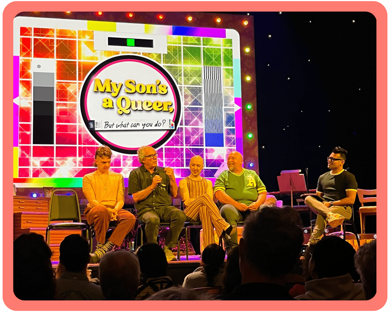 PFLAG NYC staff member Philip and PFLAG NYC volunteer Robert sit on a panel with two other people and a representative from GLAAD on stage for the show My Son's a Queer, but what can you do?