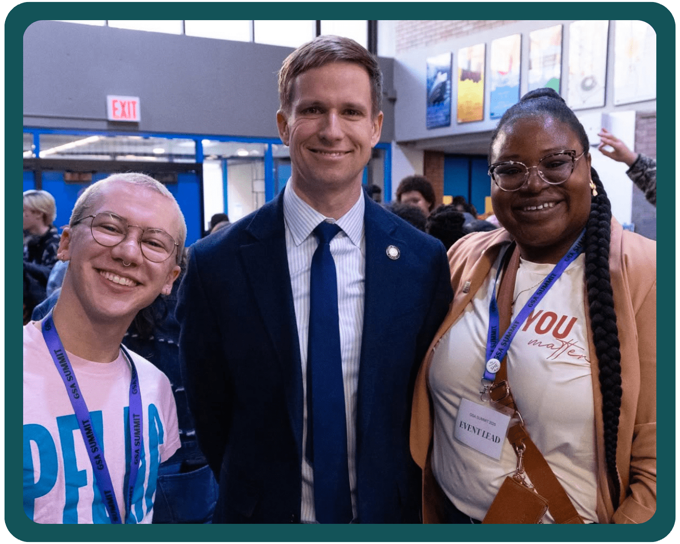 Executive Director Clark Hamel stands with City Council Member Erik Bottcher and Kalima, Manager of LGBTQ Programs for NYCPS